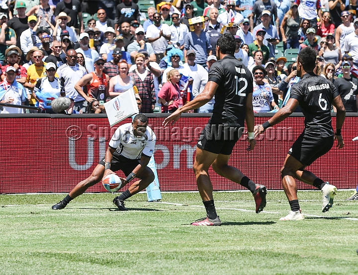 2018RugbySevensSun-15.JPG - Fiji player Alasio Sovita Naduva scores a try against New Zealand in the men's championship finals of the 2018 Rugby World Cup Sevens, Sunday, July 22, 2018, at AT&T Park, San Francisco. New Zealand defeated Fiji 22-17. (Spencer Allen/IOS via AP)